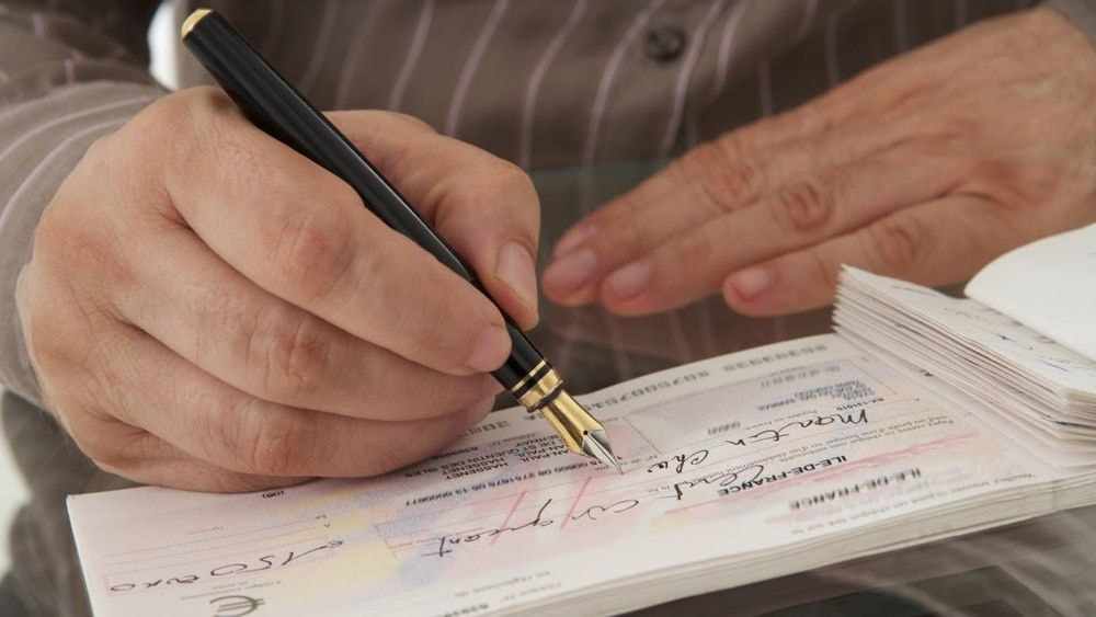 « Puis-je signer un chèque de 9 000 euros ? »