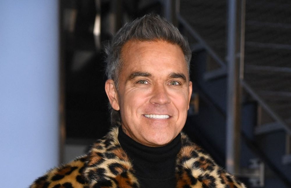 Robbie Williams : le jour où le chanteur a été pris pour un autre par la reine Elisabeth II